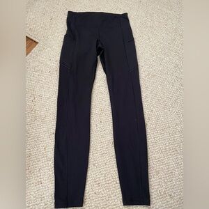 Lululemon black leggings with pockets and zip up back pocket size 6